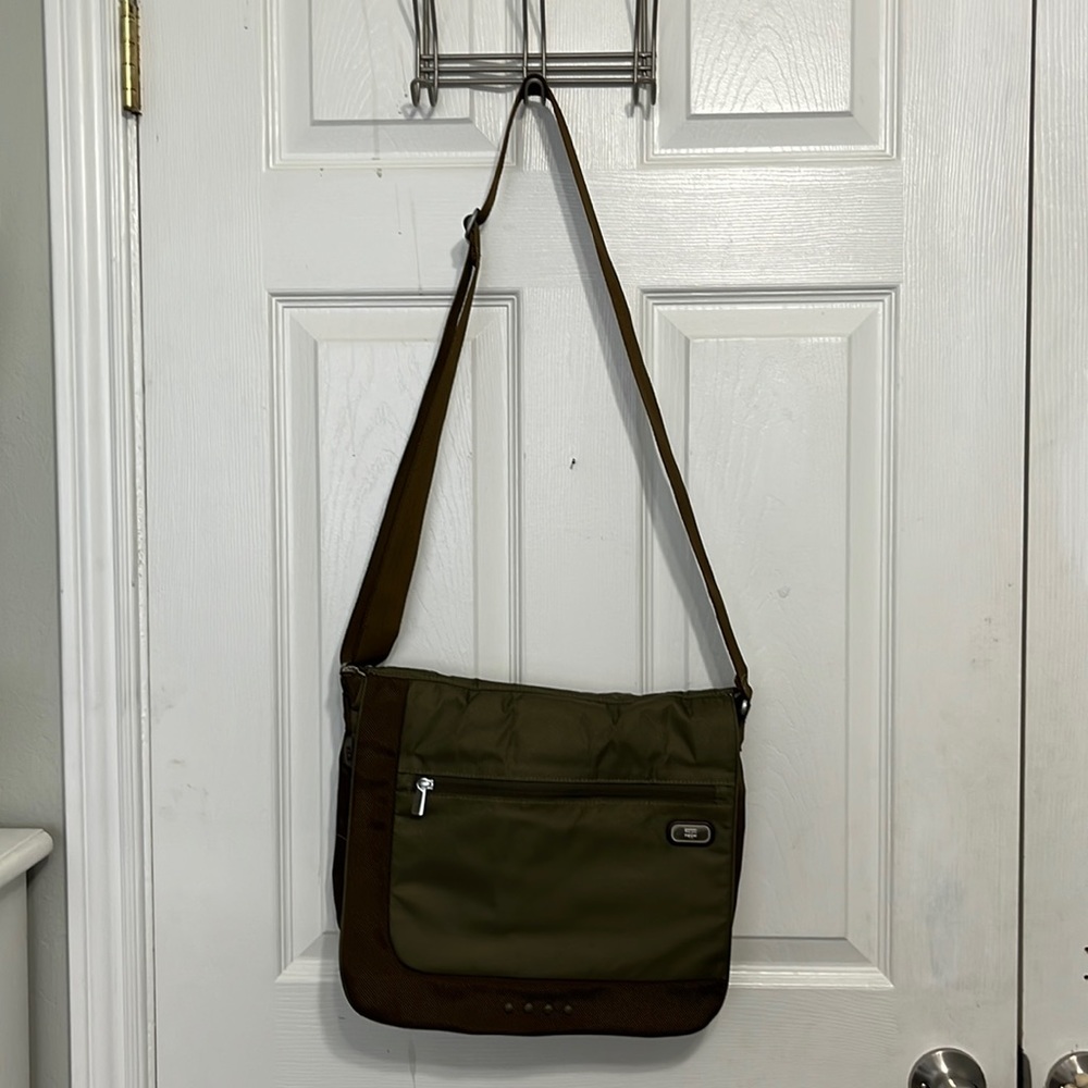 Tumi crossbody tech bag